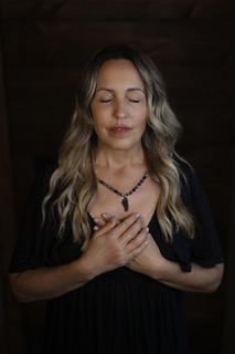 katie eyes closed black dress